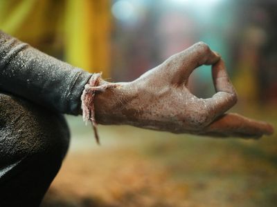 Close up of a person's hands in a mudra